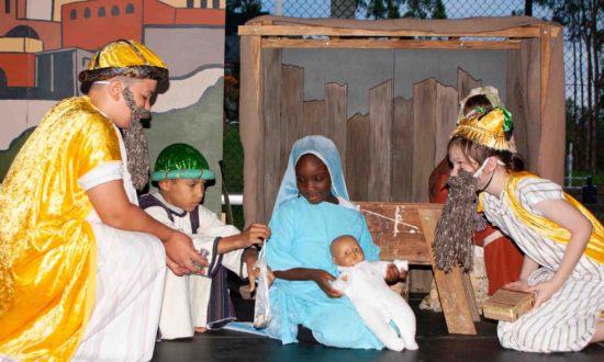 Wise kings presenting their gifts to baby Jesus