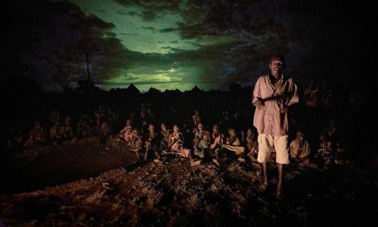 Nighttime prayer vigil for peace in Nakubuse, a small village in South Sudan