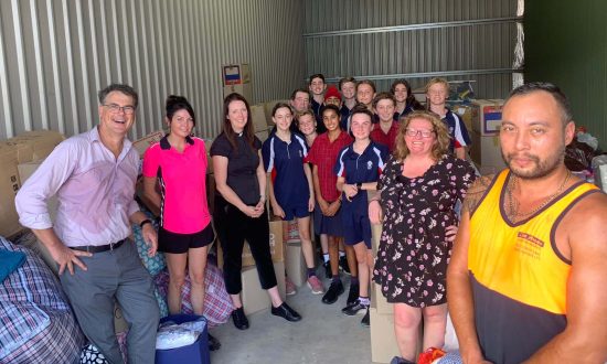 Bishop Druitt College community members assisting with flood recovery donations