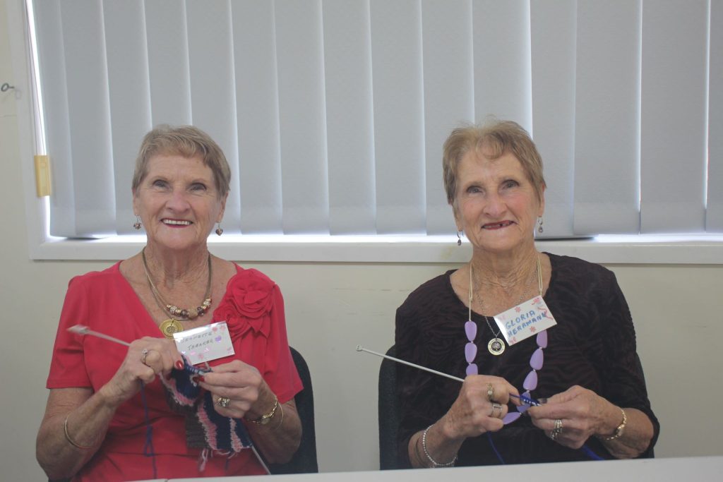 Jeanette Theaker and Gloria Herrmann knitting
