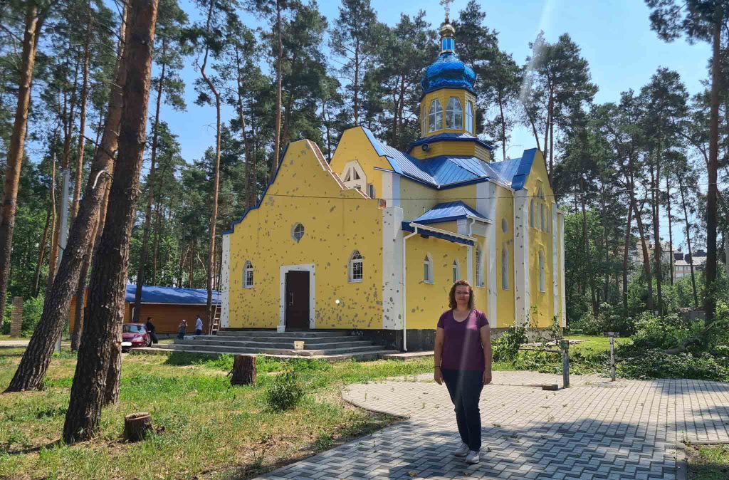Helen Zahos in front of a church in Ukraine
