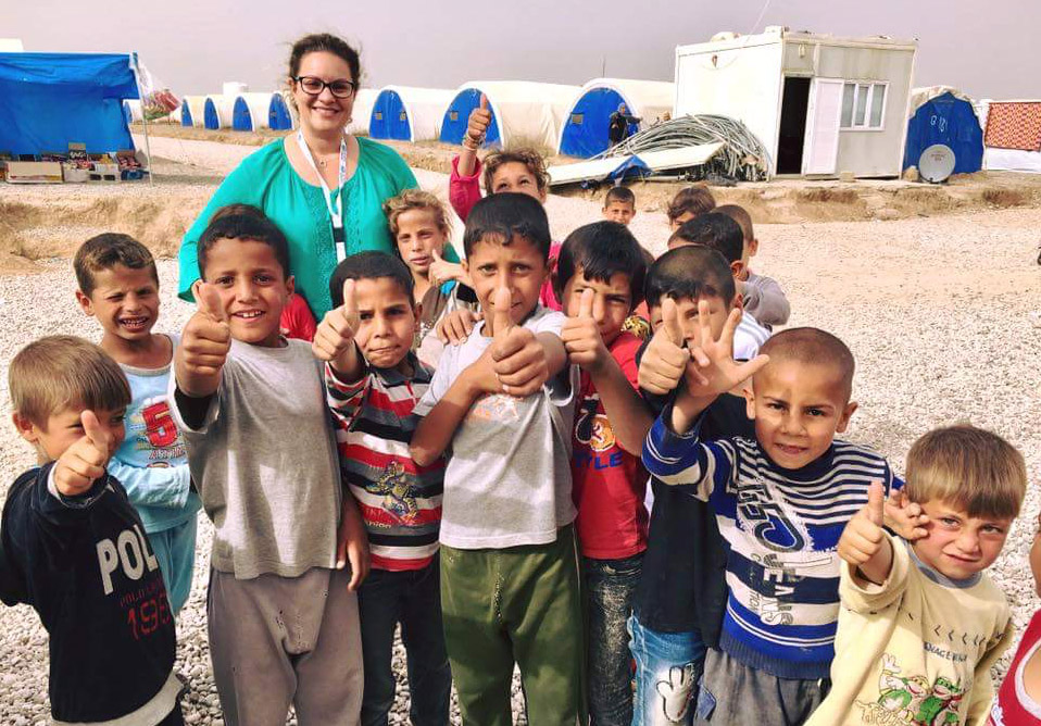 Helen Zahos with kids in IDF camp outside Mosul