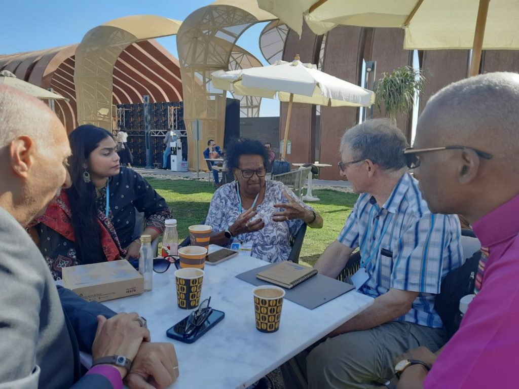The Anglican Communion’s COP27 delegation discussing the climate