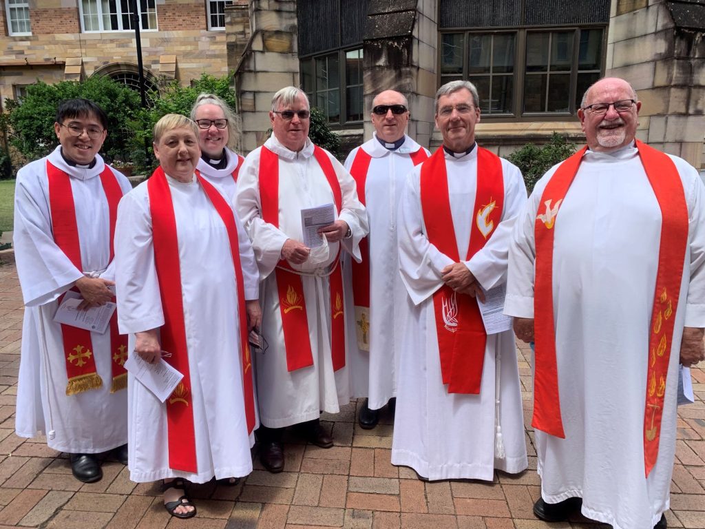 The Rev'd Simon Tang (far left) lining up for the 2022 ACSQ ordinations processional outside St John's Cathedral 