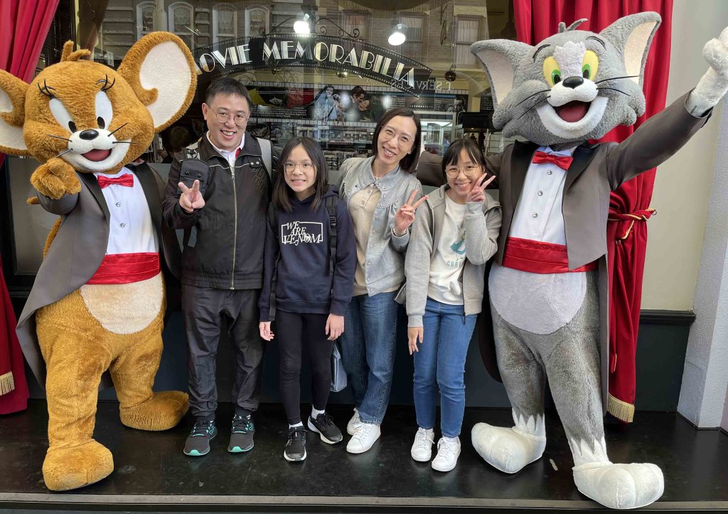 "A family photo at Movie World on the Gold Coast, with me, Jacey, Greece and Janna" (The Rev'd Simon Tang)