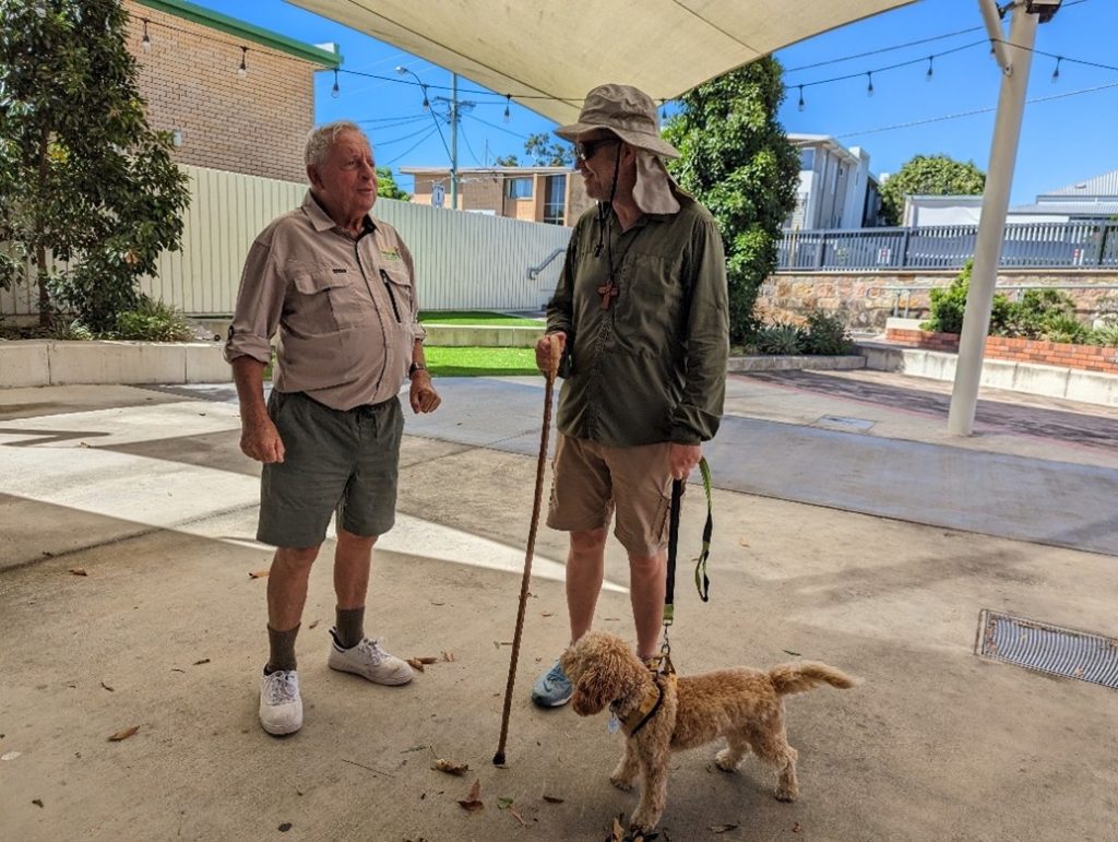 Bishop John Roundhill’s spoodle puppy walks the last leg of Bishop John’s Holy Week walk as pilgrims journey from St Stephen’s, Coorparoo to St Gabriel’s, Carindale 