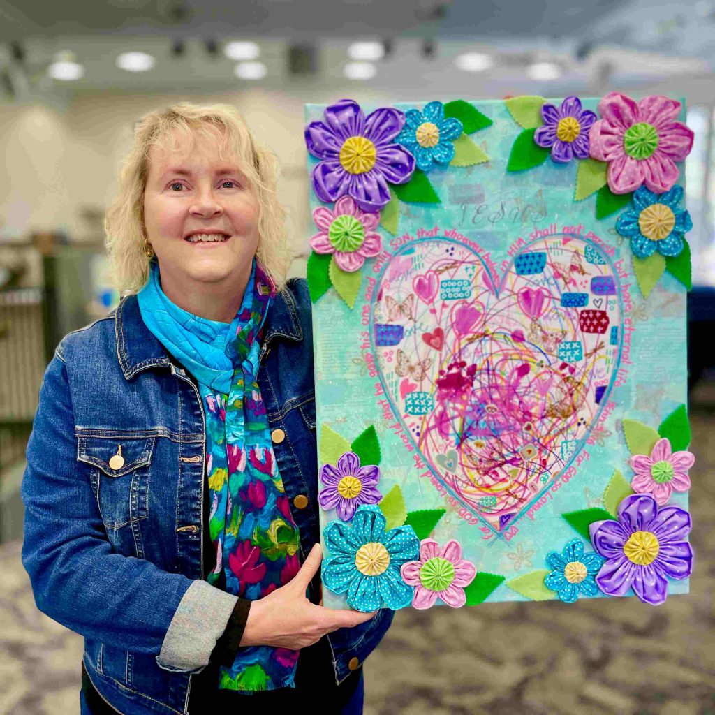 Tanya Needham, with a collaborative multimedia artwork with the assistance of her two granddaughters (Ellie, aged 2 and Ivy aged 11 months) reflecting on God’s love for us