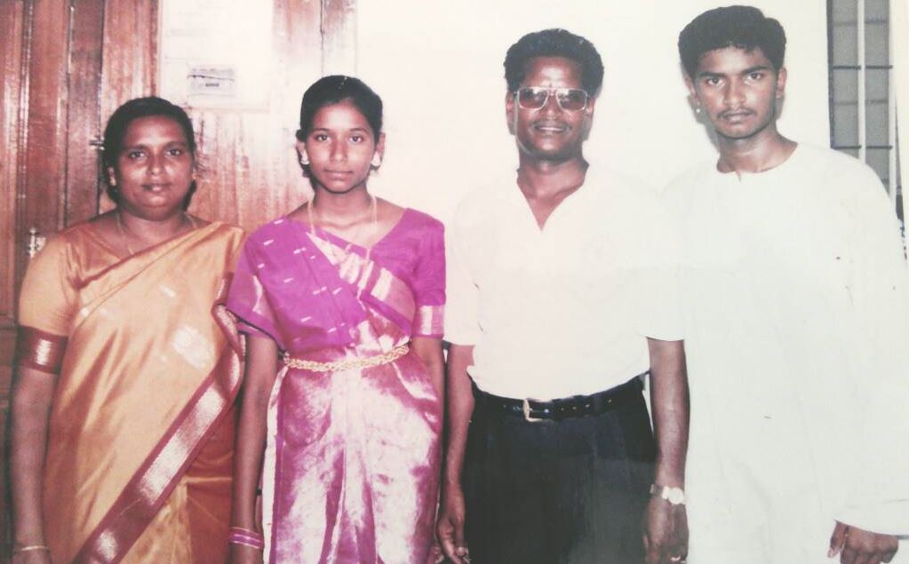 Sam Sigamani aged 15 (far right) with his family in Chennai