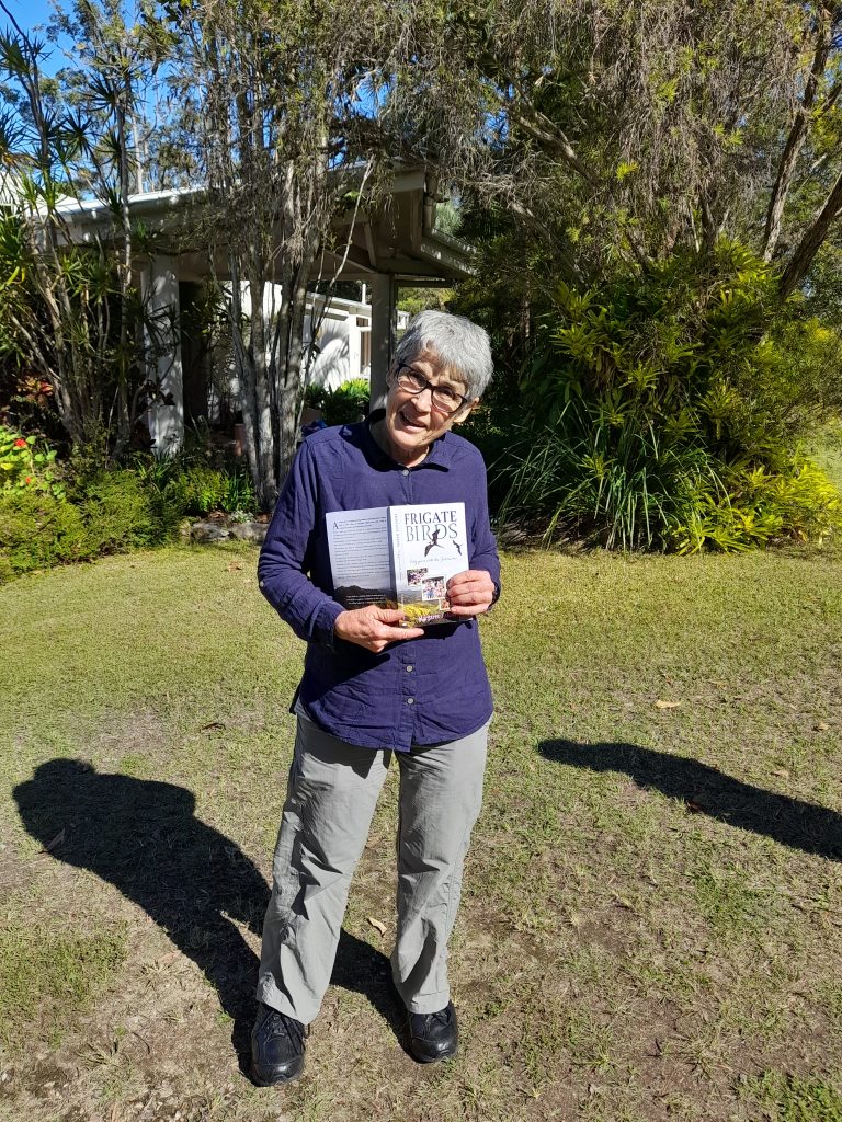 Margaret Atkin with a copy of her book Frigate Birds