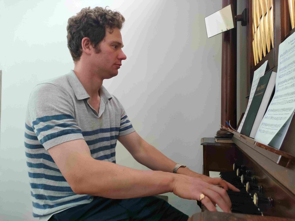 Formation student Tim Newton practising the organ