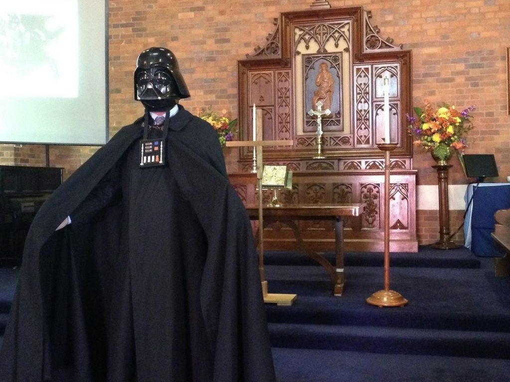 The Rev'd Peter Jeffery at a "May the Fourth" service in 2016 at Churchie 